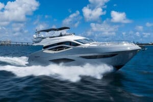 Luxury yacht sailing on the blue waters of Miami, ideal for island-hopping and day cruises with Wonder Yachting.